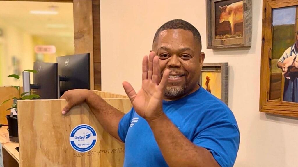 Christofferson employee packing commercial computers