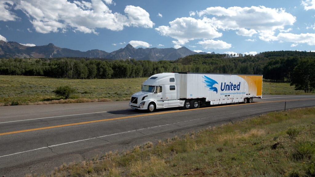 Wide view of Christofferson van traveling long-distance across the United States