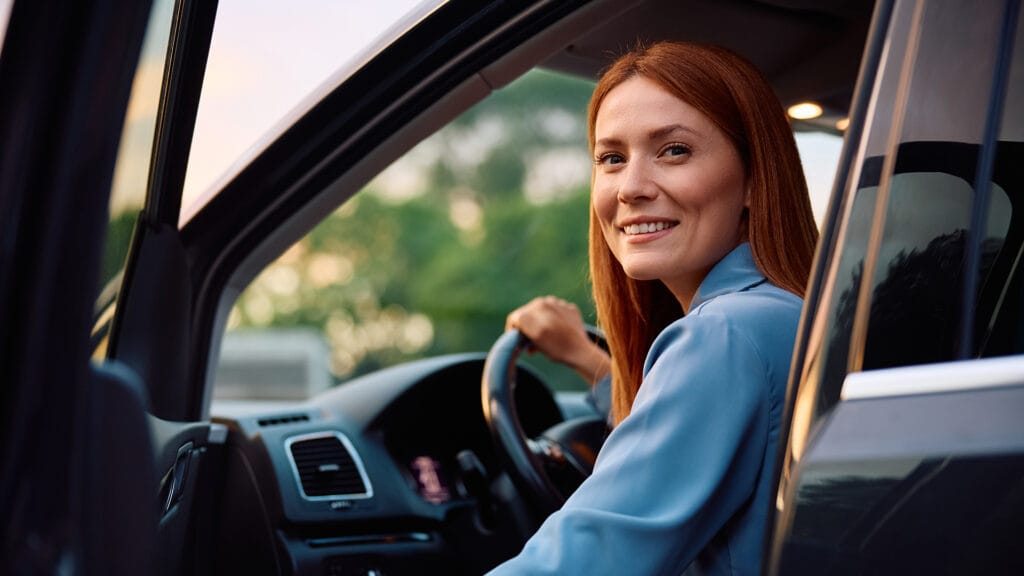 Woman preparing for long-distance and international vehicle transportation services from Christofferson