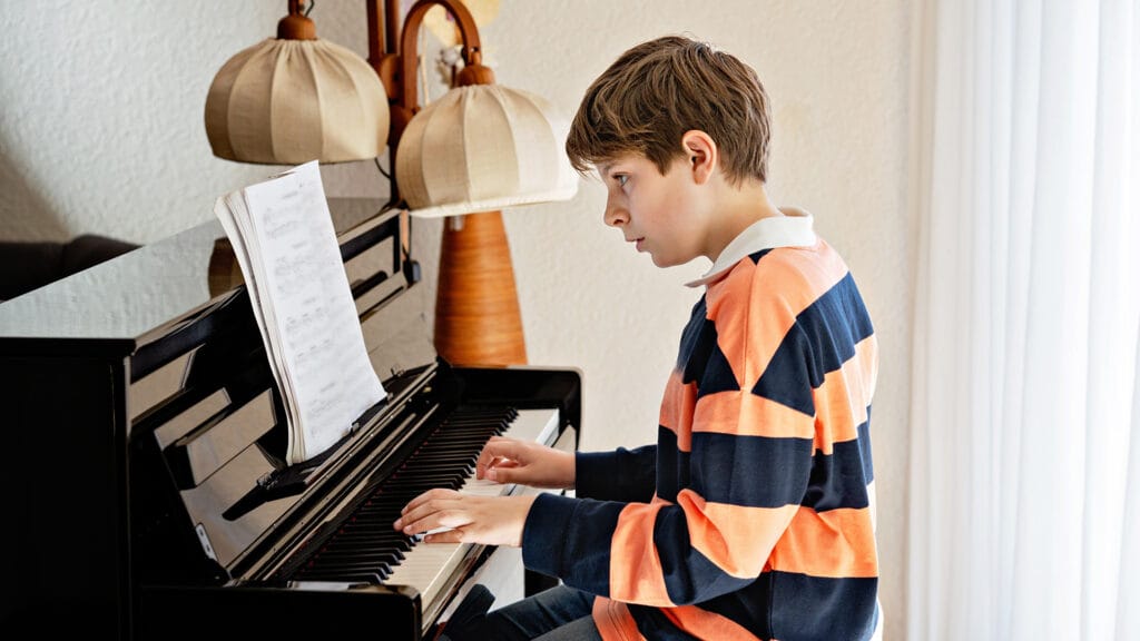 Child playing the piano