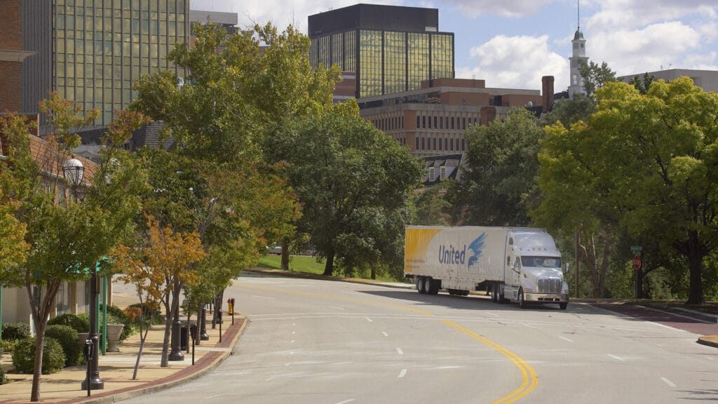 Christofferson van driving through commercial area