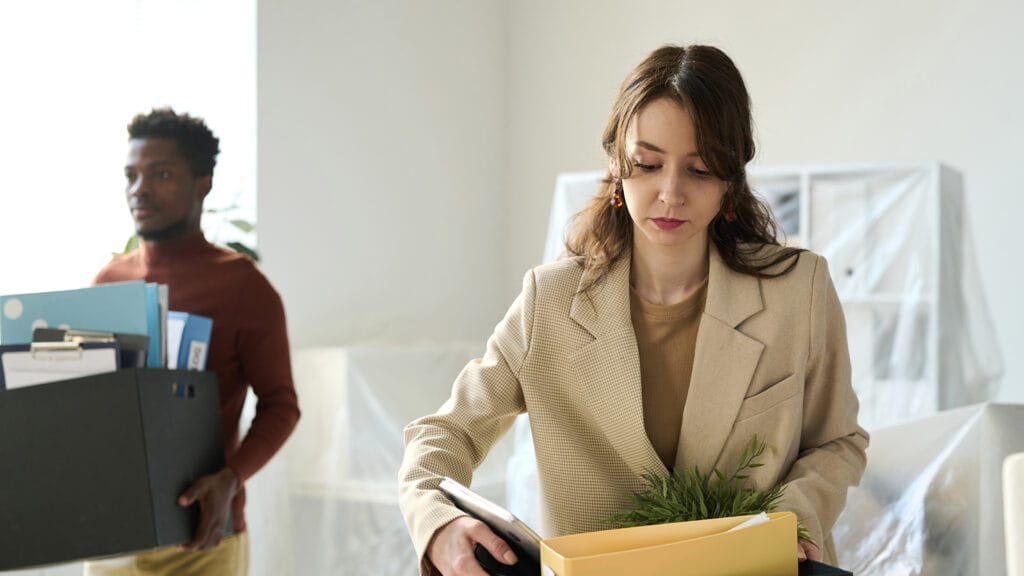 Office workers preparing for commercial moving services