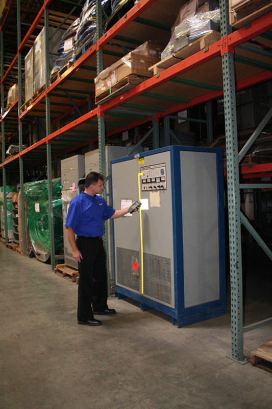 Christofferson employee scanning product in storage facility