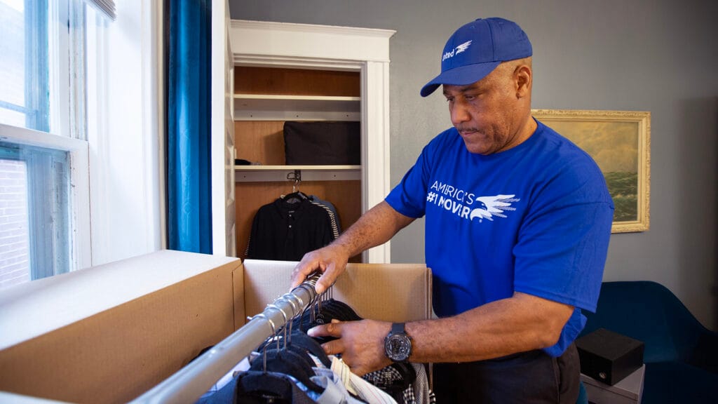 United Van Lines employee packing closet